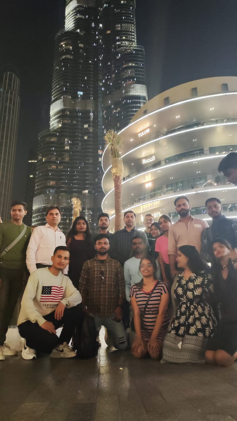 Group photo near Burj Khalifa at night